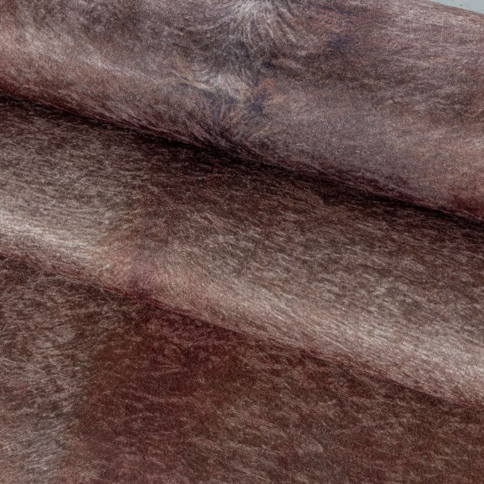 Etosha Koe antislip vloerkleed platgeweven rechthoek 100x135cm imitatie dierenhuid bruin